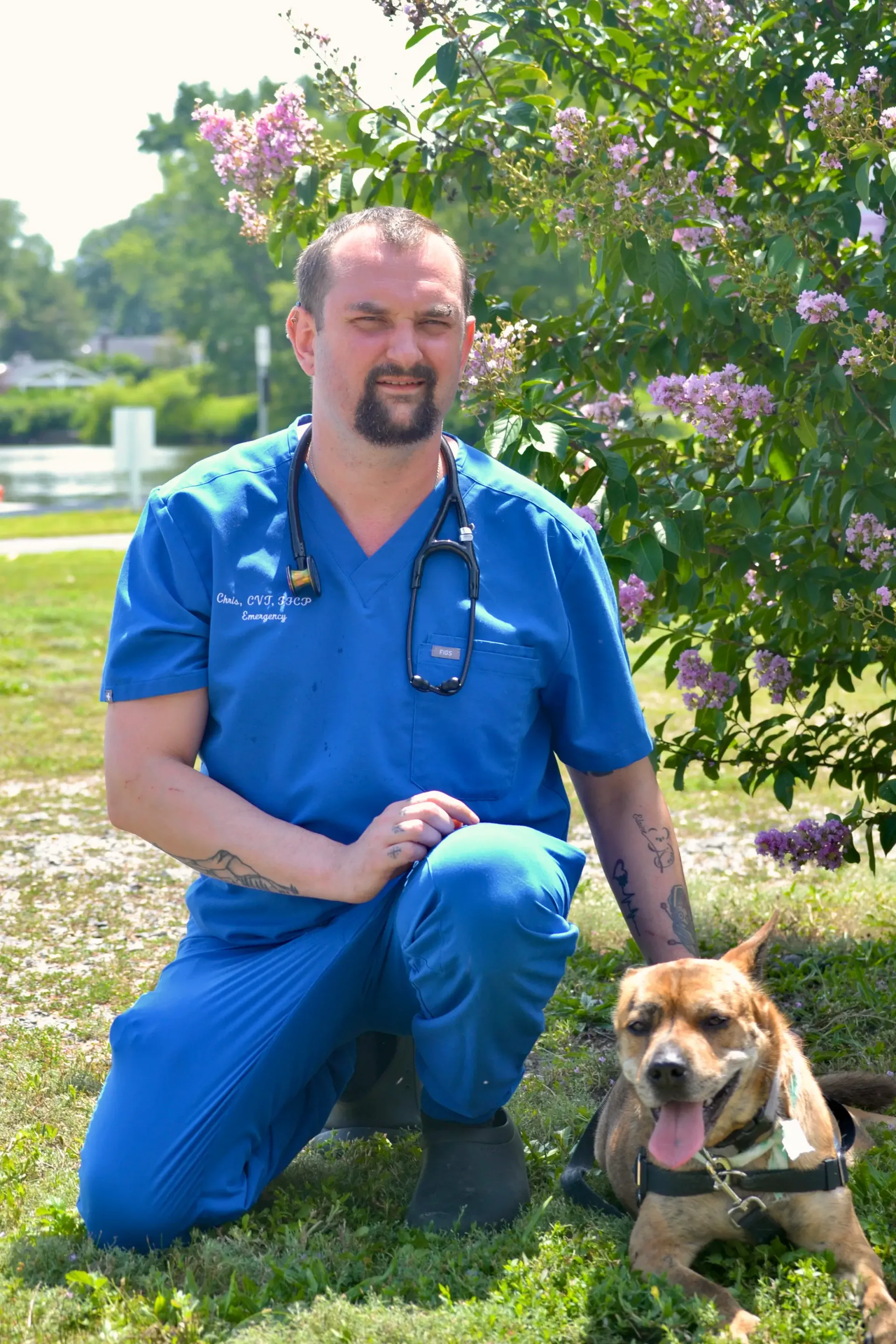 Christopher Costa with his brindle dog